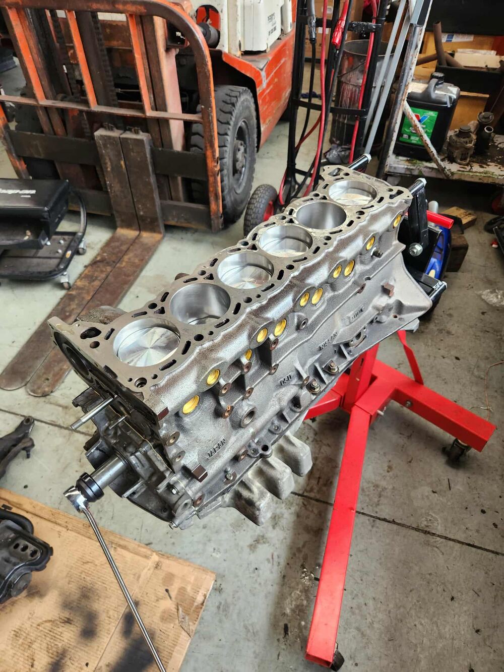 Freshly machined engine block on a stand, mid rebuild.